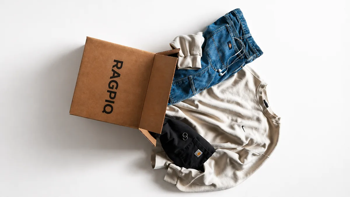 A box of quality clothing ready to be consigned